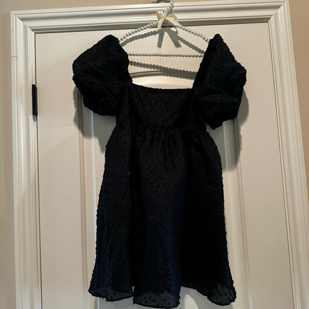 Kittenish little black dress
